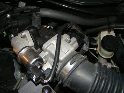 Air flows in the engine combustion chamber following the throttle body has a butterfly valve (throttle plate), which is the largest piece, which rotates on a shaft and regulates airflow. 2003 2006 Throttle Position Sensor & Body - Taurus Car ...