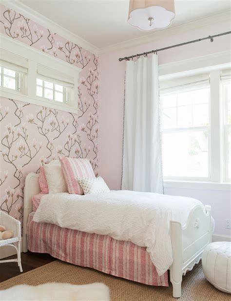 Shown in queen also available in king +$100 finish: Pink girl's bedroom features an accent wall clad in Cole ...