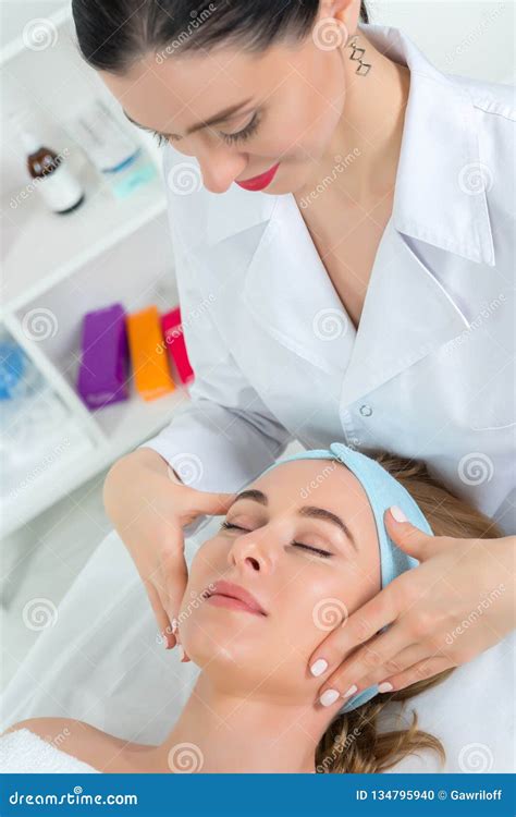 Female Beautician Doctor With Patient In Wellness Center Professional Cosmetologist Make