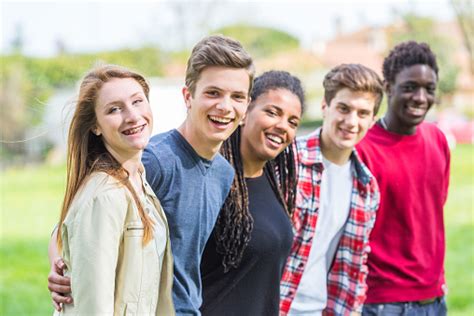 Multiethnic Group Of Teenagers Smiling Outdoors Together Stock Photo ...