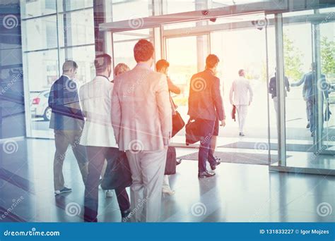 Group Of Business People Walking From Building Stock Image Image Of