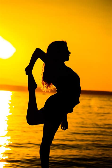 Free Photo Woman Standing On Beach During Sunset Backlit Beach Dawn Free Download Jooinn