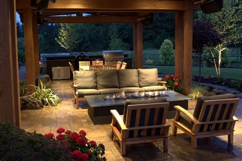 These five backyard fire pit ideas will be small enough to move to any location. Stunning gas fire pit beneath a covered patio of a Seattle ...