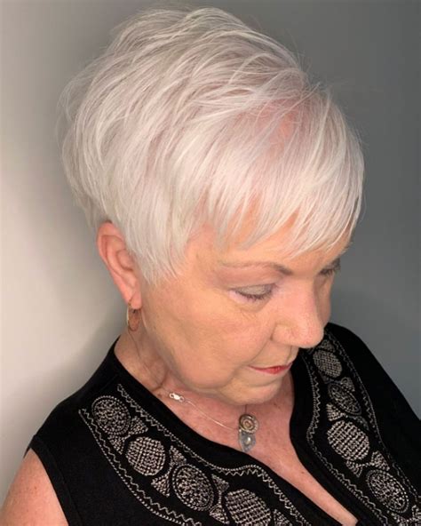 Keeping it super classical at a considerable length, (oh yes, definitely consider extensions if you must) her hairstyle is all over romantic to style a look like this, you'll be needing a straightener to smooth it over and the wispy layers should do their thing. Feathered Pixie Haircut For Women Over 70