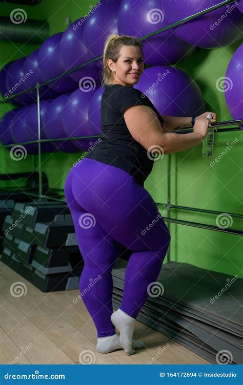 A Fat Woman Is Engaged In Aerobics And Trying To Lose Weight An Obese