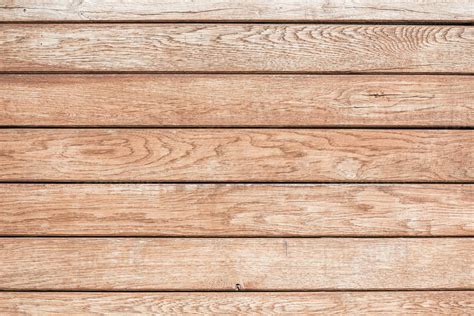 Top View Of Light Brown Wooden Background With Horizontal Planks