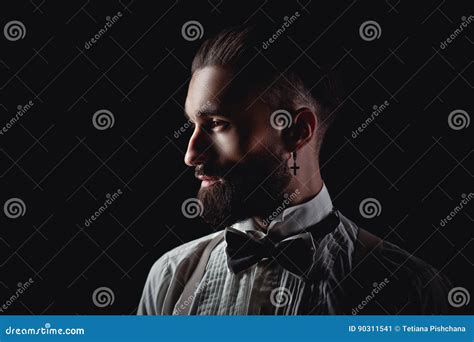 Portrait Of Handsome Man Posing For Photographer In Studio Stock Image