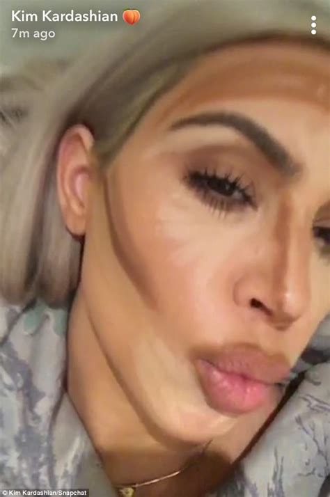 Kim Kardashian Hides Toned Body In Large Camouflage Hoodie Daily Mail
