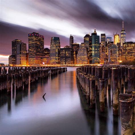 Beautiful Reflections And The Lower Manhattan Skyline By Night By