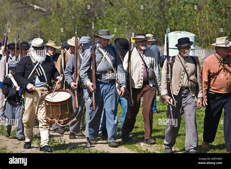 American Civil War Re Enactors Soldiers Marching Back To Camp After
