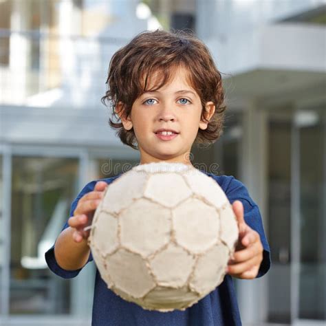 Child Holding Soccer Ball Stock Image Image Of Childhood 58053445