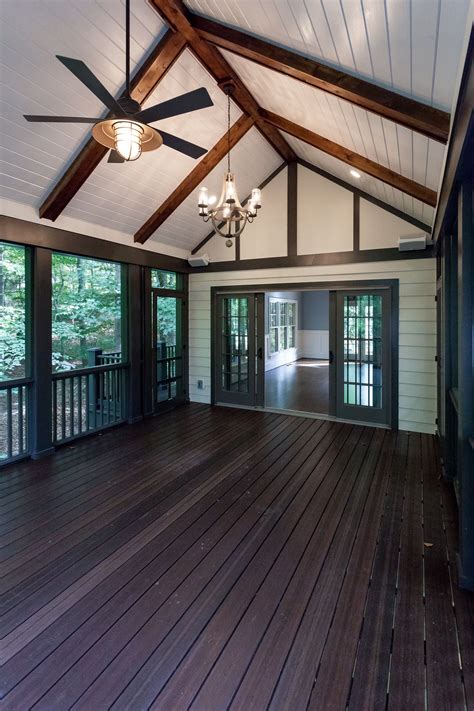 Vaulted Ceiling Screen Porch With White Painted Wood Ceiling And