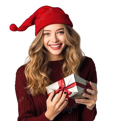 صورة عاطفية لفتاة جميلة تحمل في يديها صندوق هدايا في قبعة عيد الميلاد فتاة عيد الميلاد الصندوق