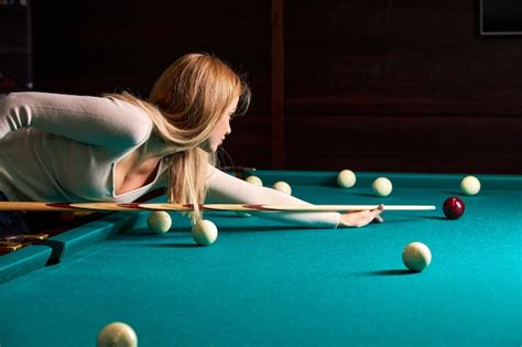 Premium Photo Woman Leaning Over The Table While Playing Snooker