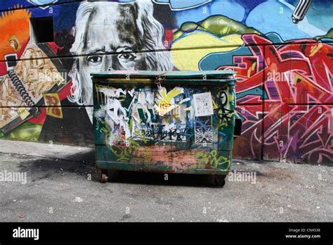 Wall And Garbage Dumpster Covered In Graffiti Near Gastown Vancouver