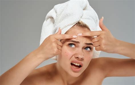 Premium Photo Emotional Woman With A Towel On Her Head Squeezes Out