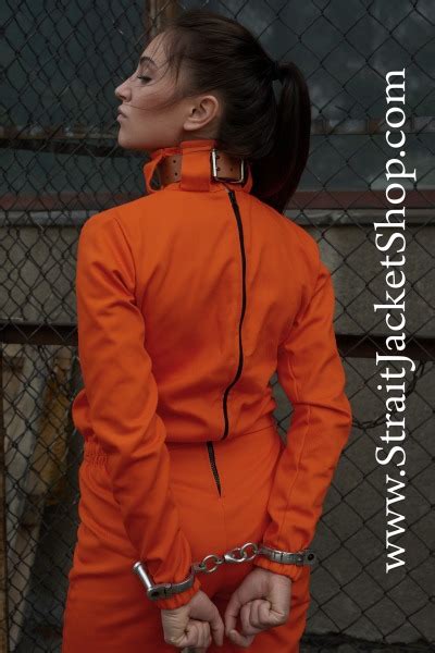 Woman Poses As Prisoner In Matching Suit Transport Belt And Handcuffs