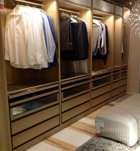 Modern walnut walk in wardrobe with glass fronted drawers | strachan. Walk-in closet PAX wardrobe solution. IKEA Amsterdam # ...