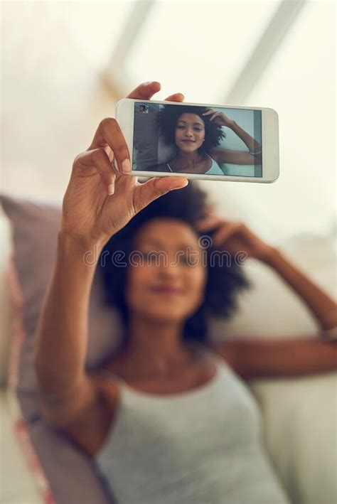 She Knows How To Take The Perfect Selfie A Young Woman Taking A Photo Of Herself Stock Image