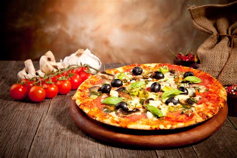 Delicious Fresh Pizza Served On Wooden Table Pizza Schulede