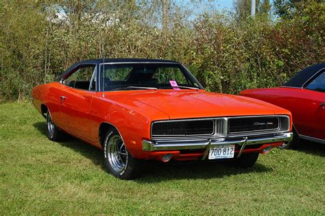 It's a brawny family hauler with butch looks, and a roster of powerful engines. Dodge Charger - Wikipedia