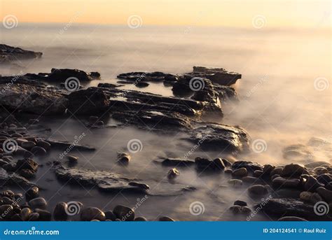 Sunrise On The Rocky Beach Stock Image Image Of Scenery 204124541