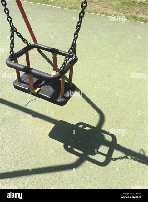Swing In Playground Stock Photo Alamy