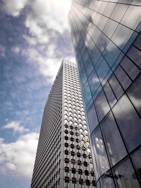 Download Tall Skyscrapers Clouds Royalty Free Stock Photo And Image