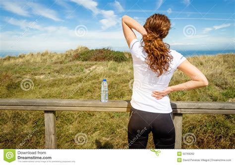 This is a table of skeletal muscles of the human anatomy. Athletic Woman Touching Neck And Back Muscles By Stock Photo - Image: 50769262