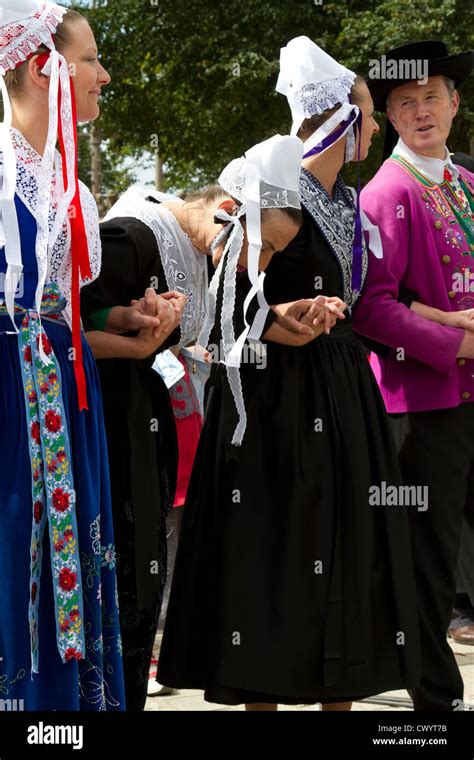 People From Plougastel Daoulas Wearing The Traditional Costume And