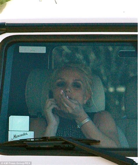 Britney Spears Flashes Her Black Lace Bra Under A Sheer Blouse As She Hits Store Target Daily