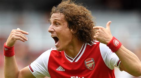 She is older than him. Arsenal Player David Luiz in Rwanda - Arsenal Star player ...