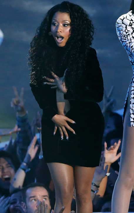 Nicki Minaj Stages Wardrobe Malfunction Dress Rips Apart