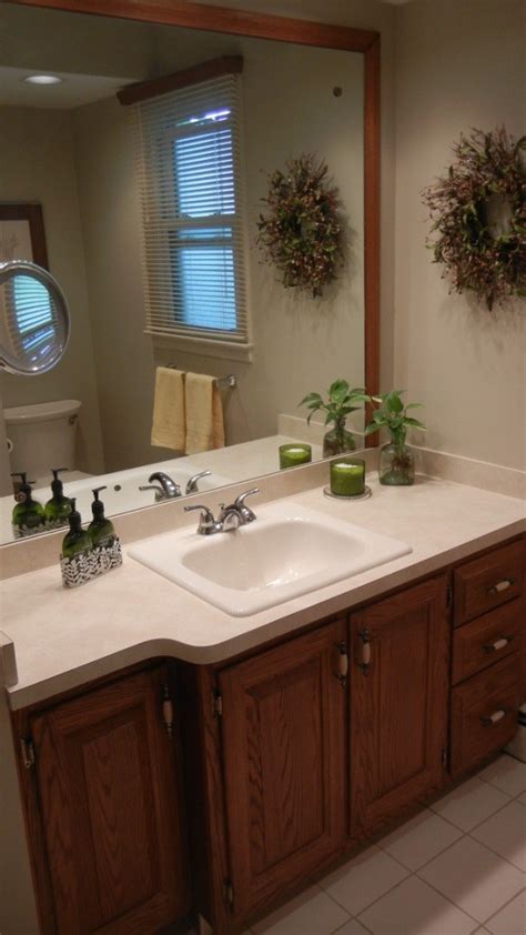 Changing the tiles of a bathroom can have a drastic effect. Bathroom Paint Color to Coordinate With Beige Tile ...
