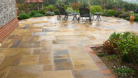 The front yard landscape design layout should be kept simple as not to overwhelm the eye for a diy project. How to build a stone patio on your own | HireRush Blog