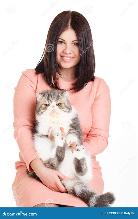Beautiful Smiling Brunette Girl And Her Big Cat On A White Background