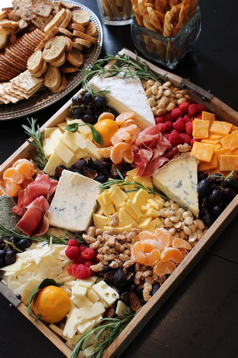 The art of food and fruit carving is really mesmerizing. Cheese and Fruit Tray: How-To - SevenLayerCharlotte ...