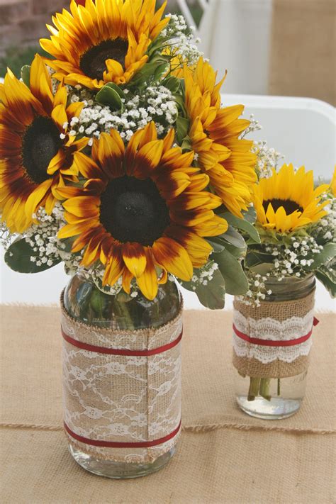 Sunflowers And Babys Breath In A Mason Jar As Rustic Wedding