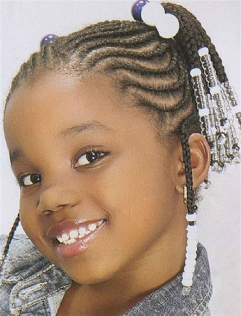 Go through with a curling iron to tighten random curls then tie your mane into a bun. 71 Cool Black Little Girl's Hairstyles for 2020-2021 ...