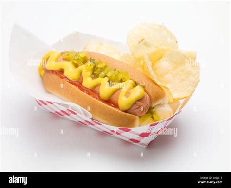 A Hot Dog With Potato Crisps Stock Photo Alamy