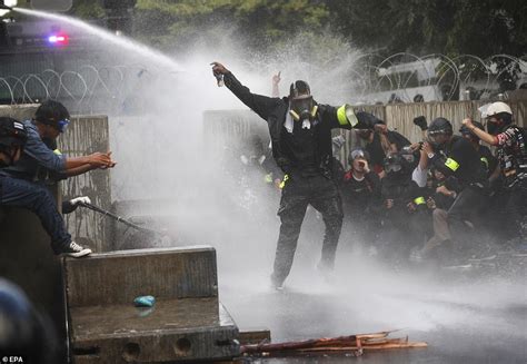 Thai Cops Fire Water Cannons At Anti Monarchy Protesters After They