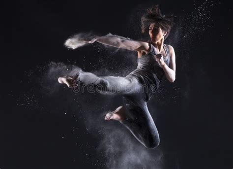 Female Martial Artist With Powder Jump Kick Stock Image Image 30978091