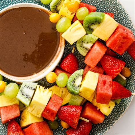 Fresh Fruit Skewers Served With Chocolate Dipping Sauce Is A Delicious