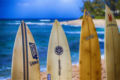 Surf Boards Stand Tall In The Sand Of Sunset Beach Hawaii Along The