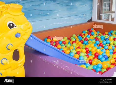 Toddler Slide And Colorful Playing Balls In The Childrens Playground