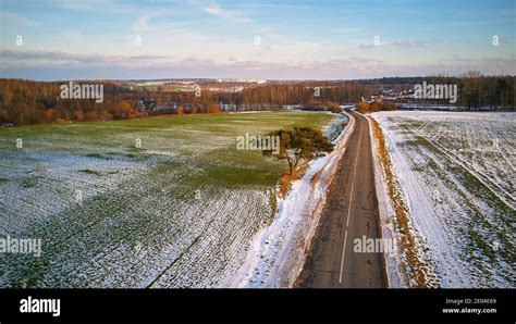Winter Agricultural Field Under Snow Countryside Road Aerial View