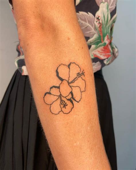 Hand Poked Hibiscus Flower Tattooed On The Forearm