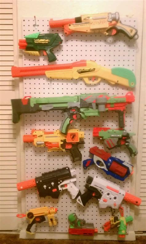 (this will need to be cut into sections depending on your wall length at the store). Nerf Gun Rack...Total cost $12! My hubby is so proud to ...