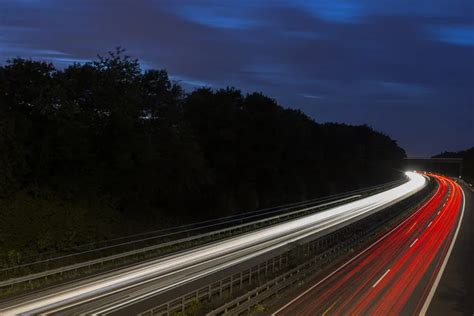 Long Time Exposure Freeway Cruising Car Light Trails Streaks Of Light