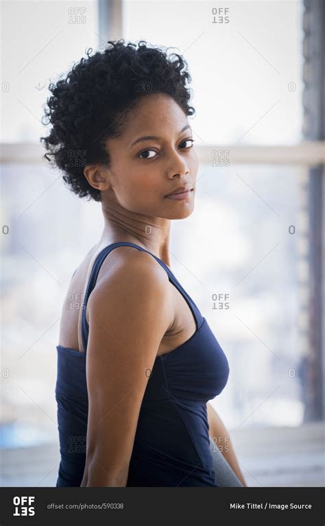 Woman Looking Over Shoulder Offset Stock Photo OFFSET